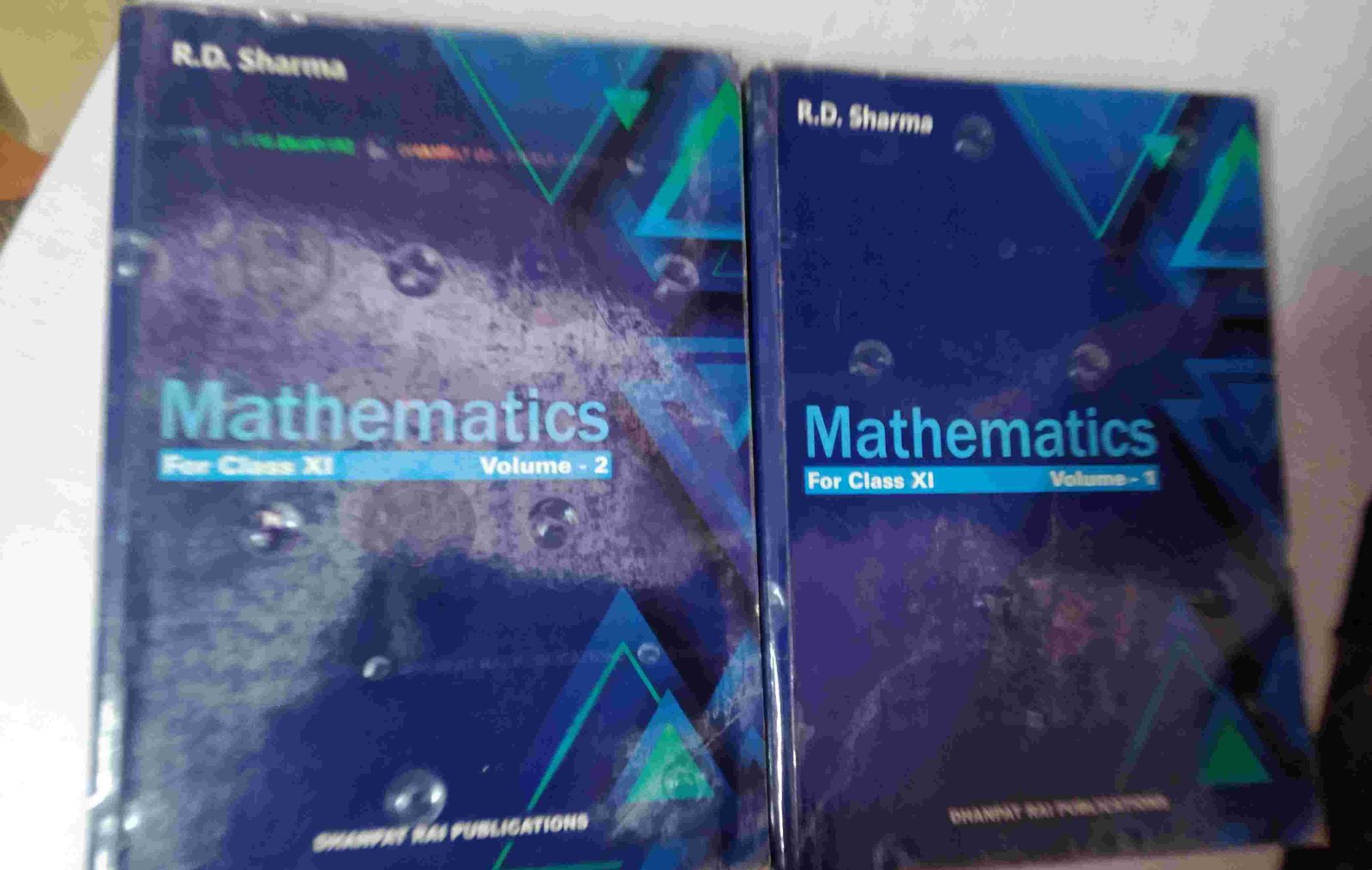 RD Sharma mathematics for class XI Volume 1 and 2